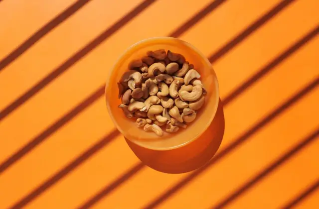 Unsalted Nuts & Orange &ndash; snack on the 7-Day DASH Diet Meal Plan